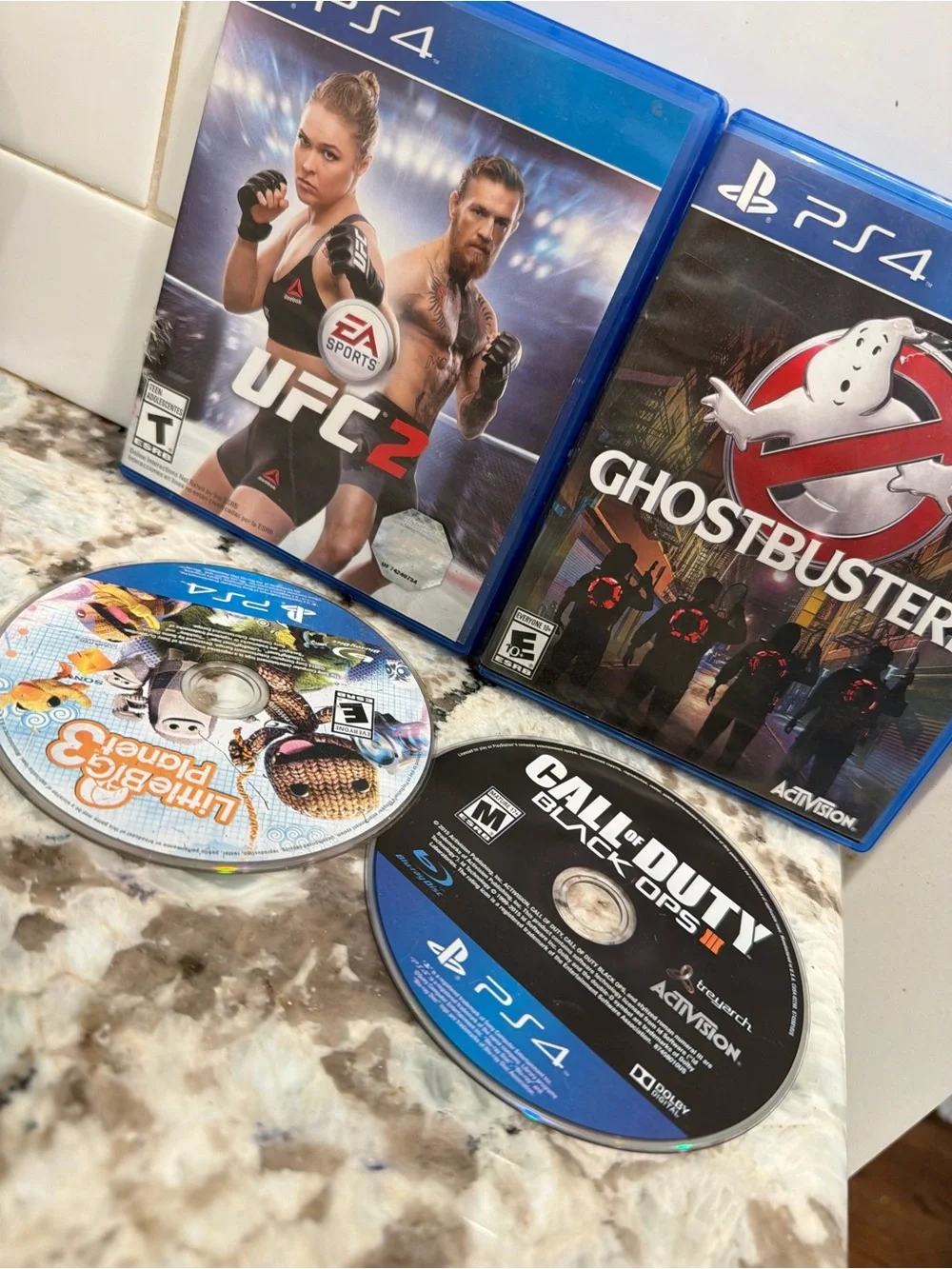Sony PS4 Game Lot – Blue Cases with Mixed Discs